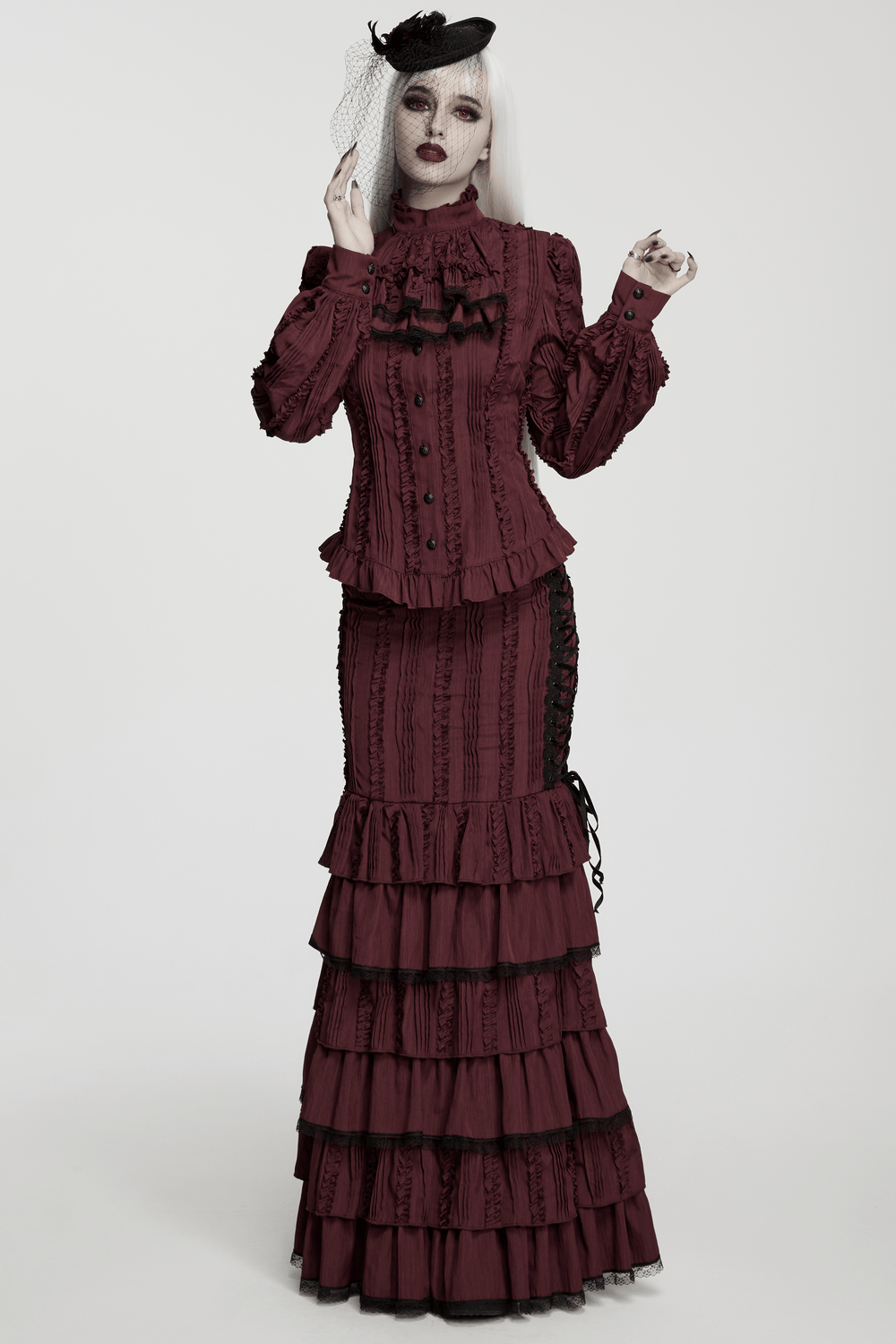 Women's Gothic Rose Veil Fascinator Hair Clip Hat worn with elegant vintage-inspired outfit, exuding dramatic flair.
