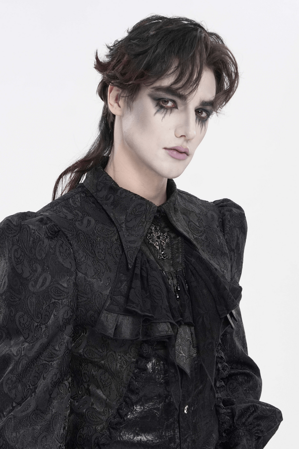 Black Gothic Lace Jabot Choker with Cross Pendant styled with a dramatic gothic outfit, featuring ruffles and beads.