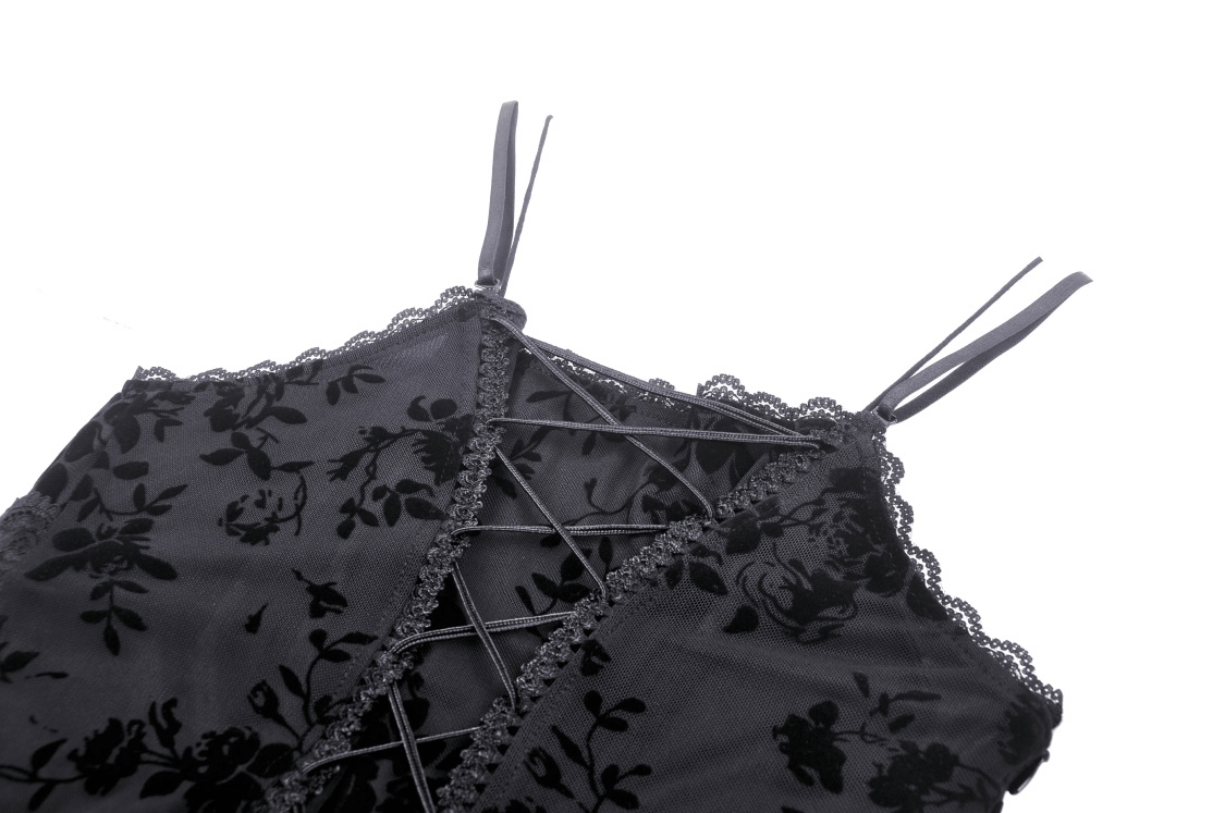Black lace detail of a gothic rose maxi dress featuring delicate straps and intricate floral patterns.