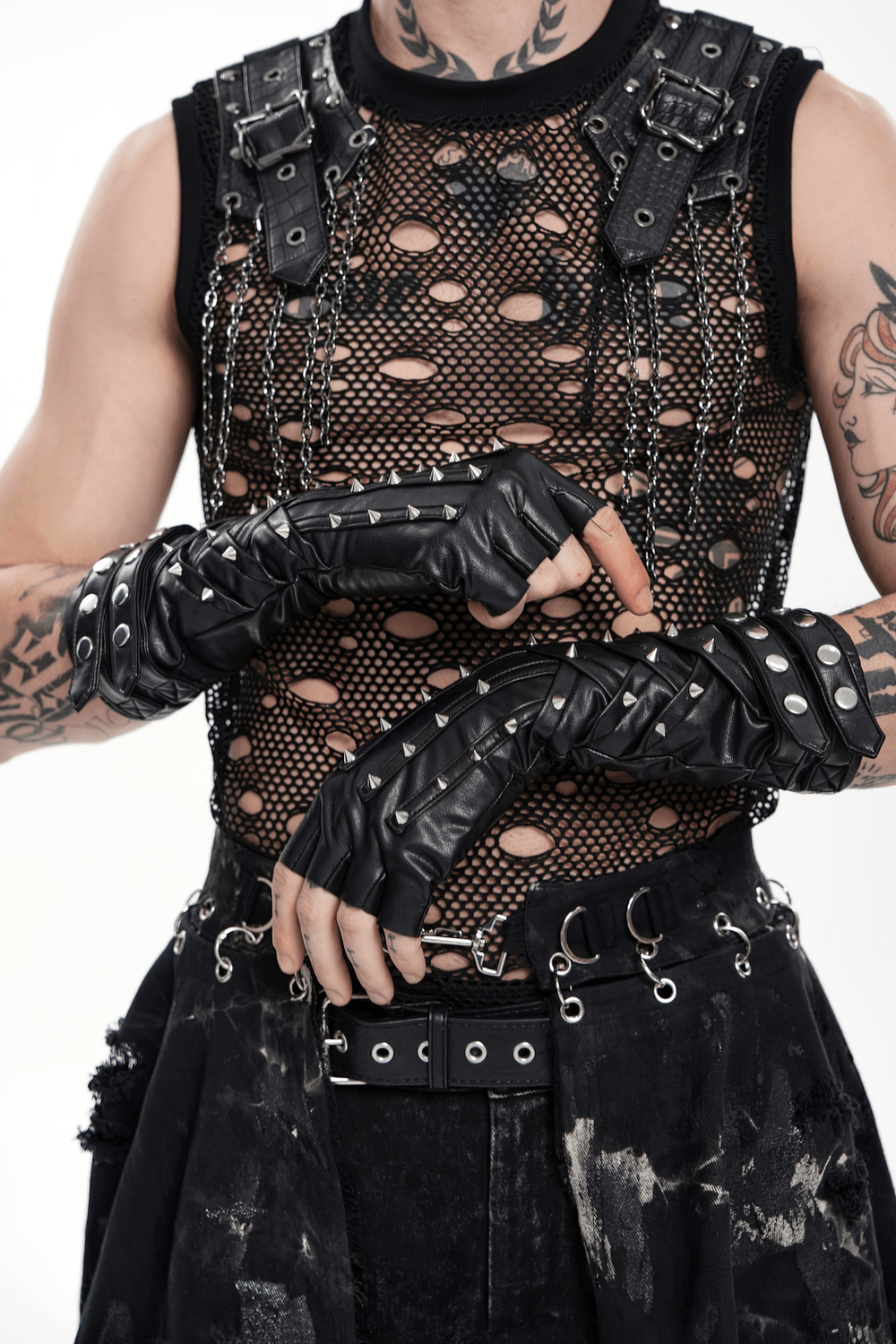Black Punk Fingerless Gloves with Metal Studs worn by a model in a punk outfit featuring chain details.