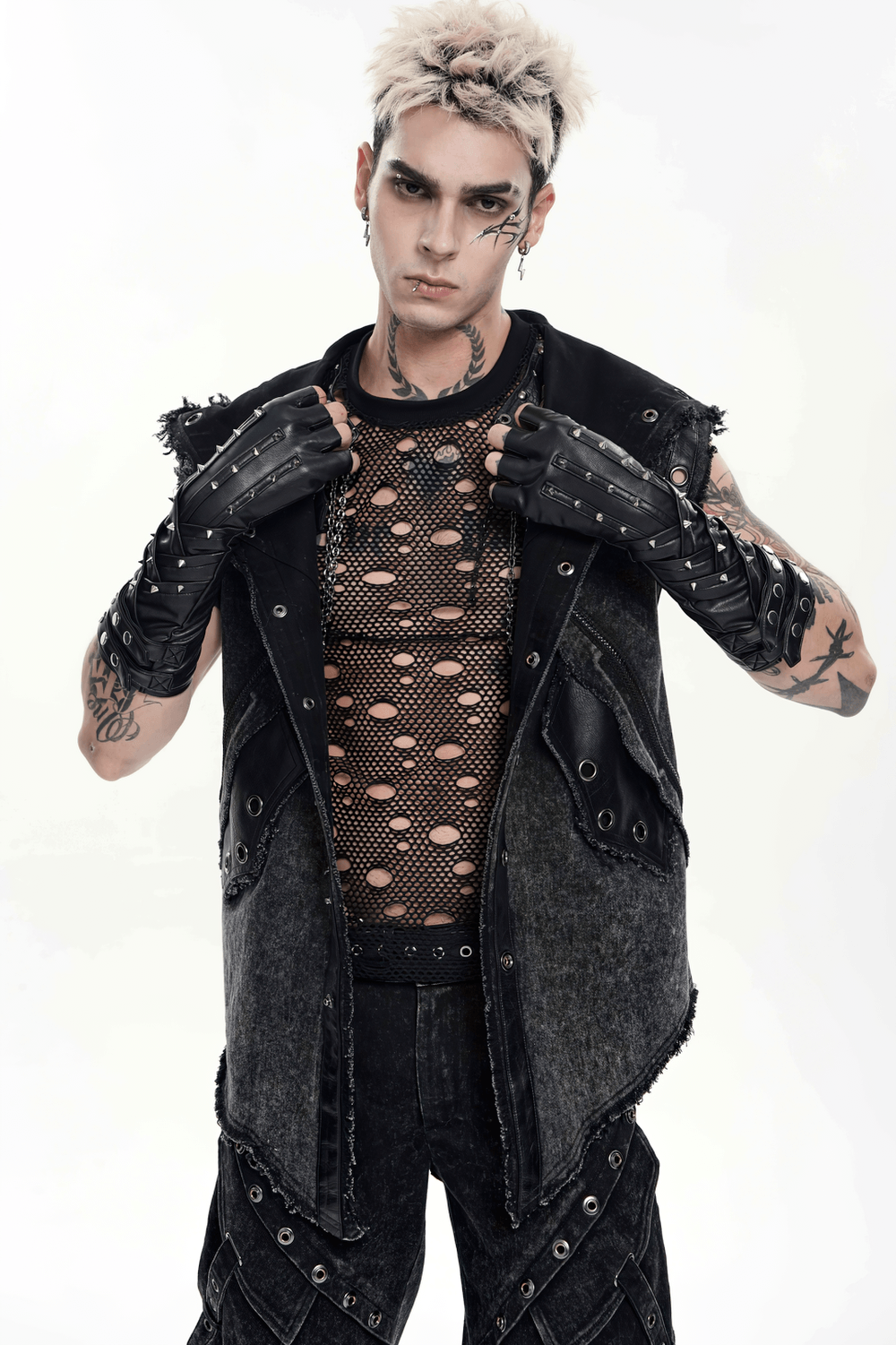 Black Punk Fingerless Gloves with Metal Studs worn by a model showcasing a bold cyber goth style.