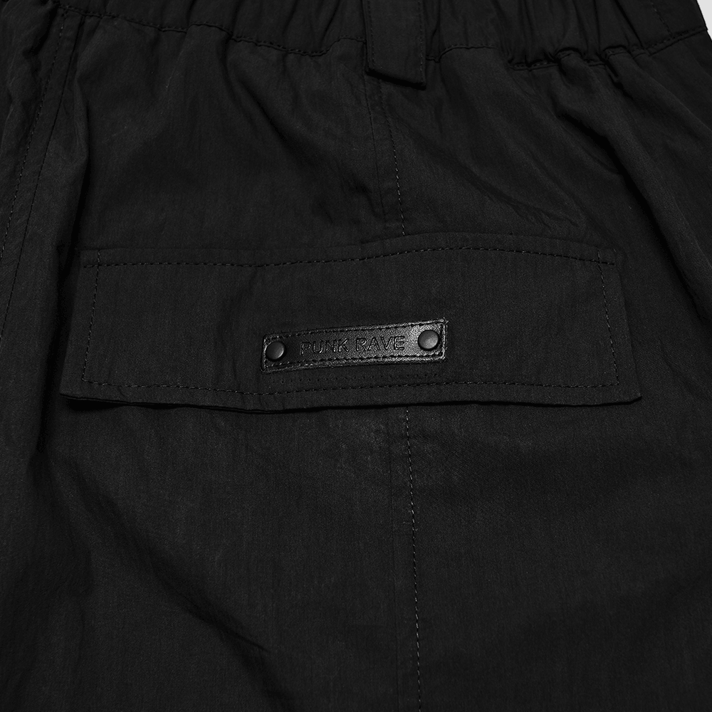 Black Techwear Cargo Shorts With Hanging Straps featuring back pocket design and Utility label detail.