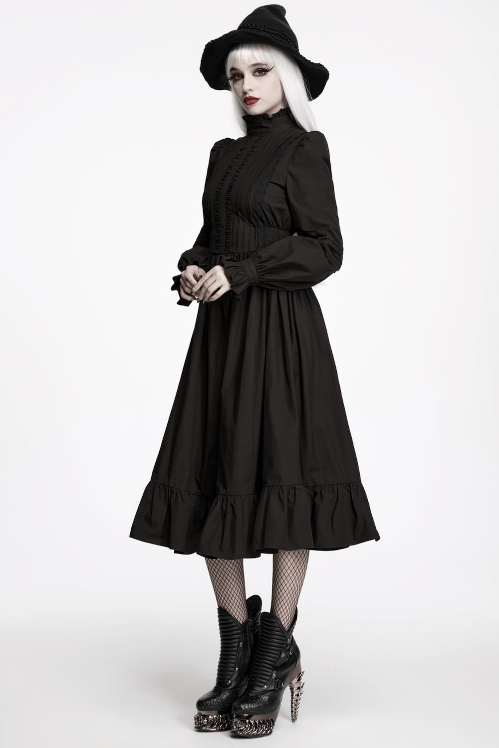 Black Victorian Gothic Midi Dress with Ruffle Hem worn by model with stylish accessories.