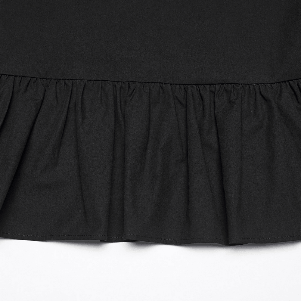 Close-up view of the ruffle hem of the Black Victorian Gothic Midi Dress with Ruffle Hem, showcasing intricate detailing.