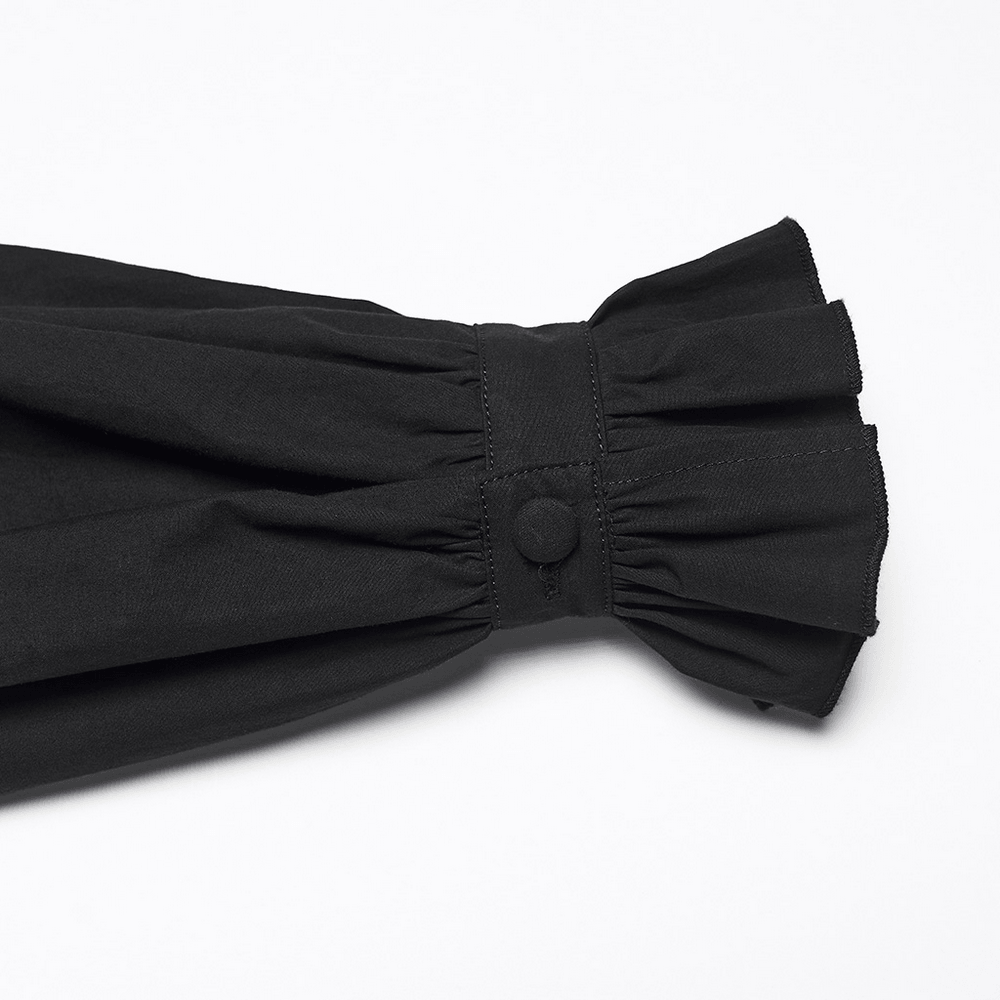 Close-up of the ruffled cuff detail on the Black Victorian Gothic Midi Dress with Ruffle Hem.