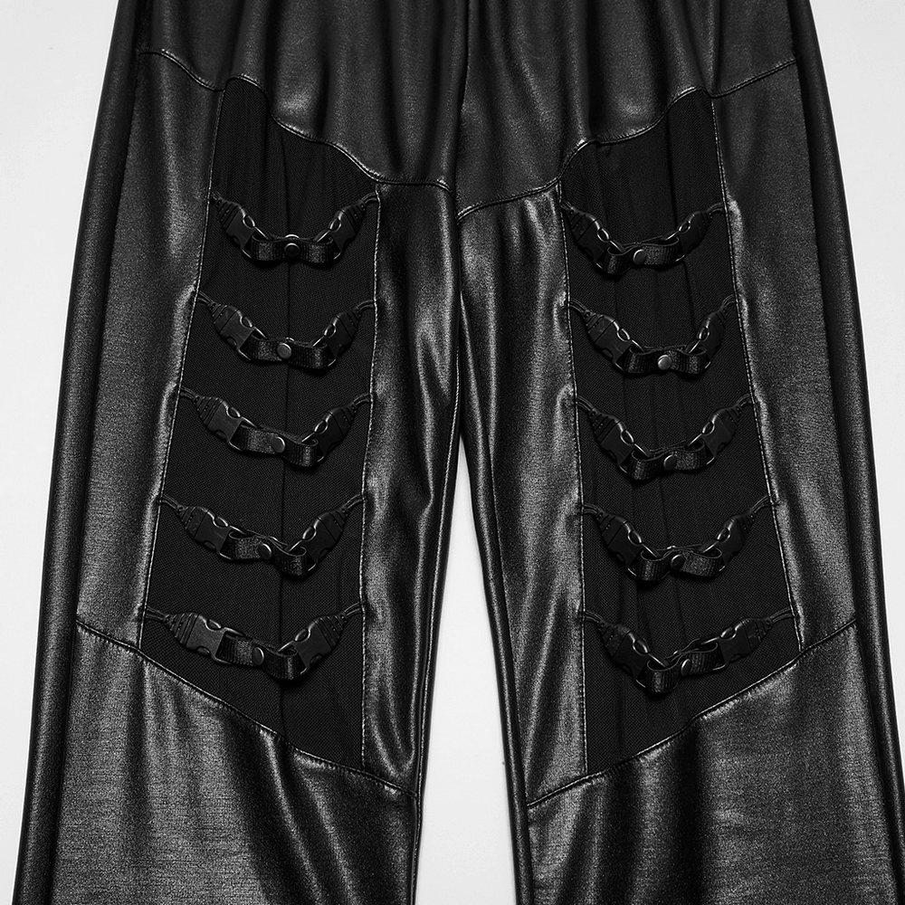 Bold Black Faux Leather Buckle Cutout Punk Leggings with mesh panels and rivet straps from a close-up view.
