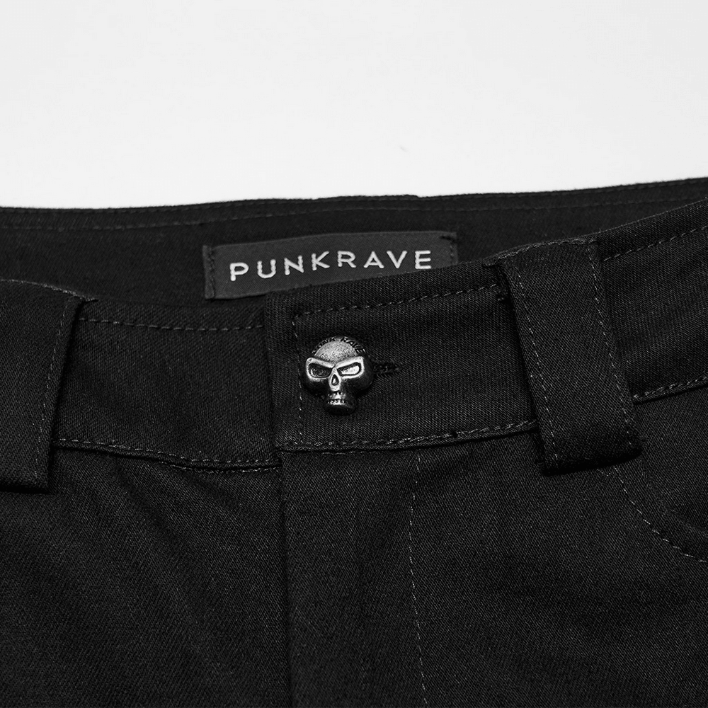 Bold Gothic Lace-Up Skinny Jeans with Buckle Details featuring a skull button embellishment.
