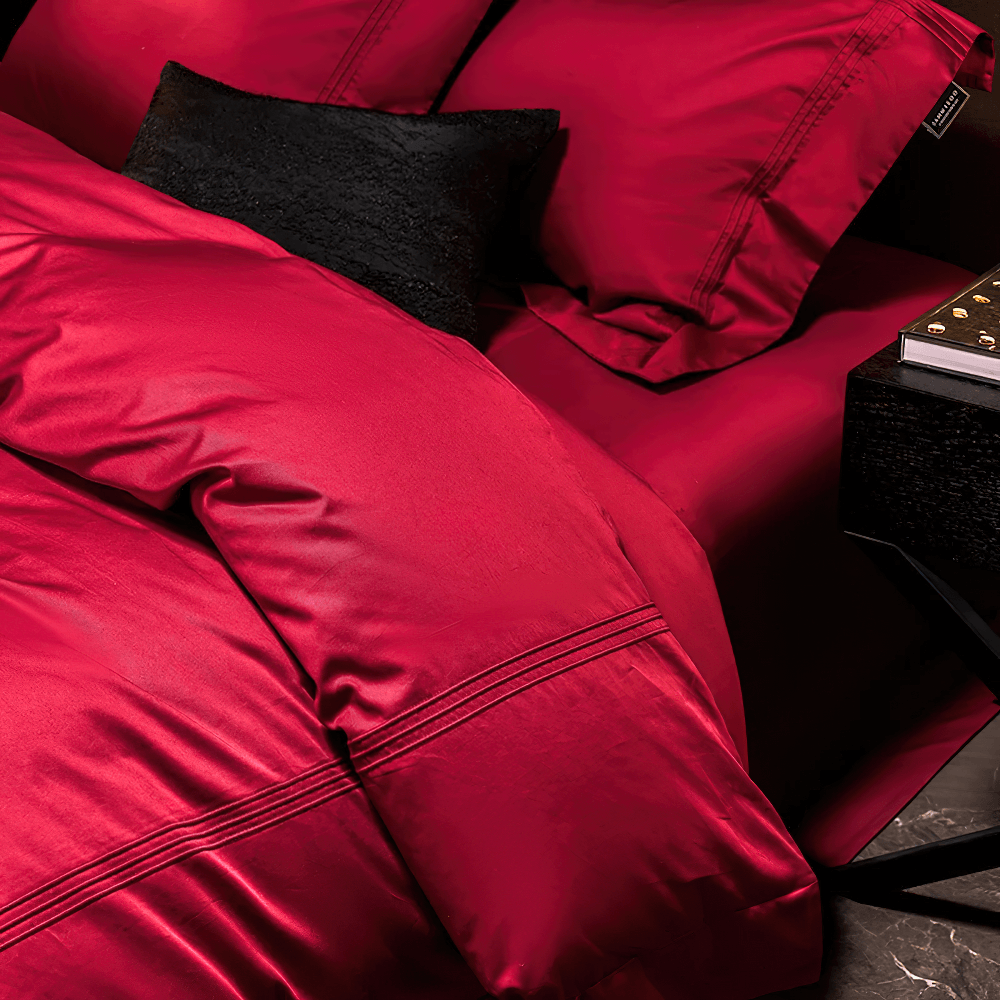Burgundy 1000TC Egyptian Cotton Luxury Bedding Set displayed on a bed with black accents for a luxurious look.