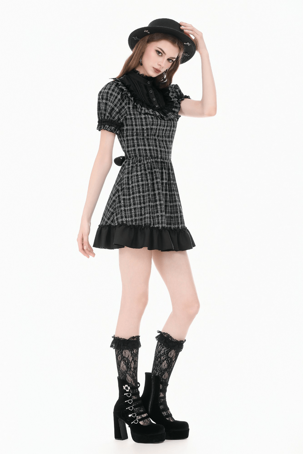 Female Plaid Lolita Dress with Lace Ruffle Trim and Bow styled with lace stockings and platform boots