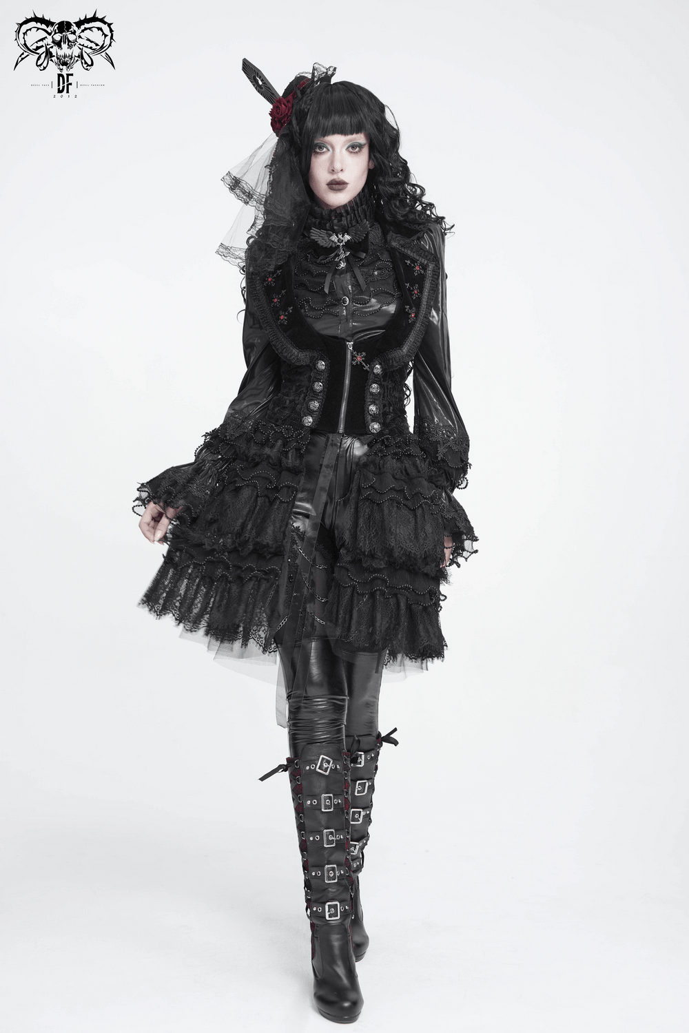 Goth Bat Wing Bow Brooch with Cross Pendant and Ribbon showcased on a model in a dramatic gothic outfit.