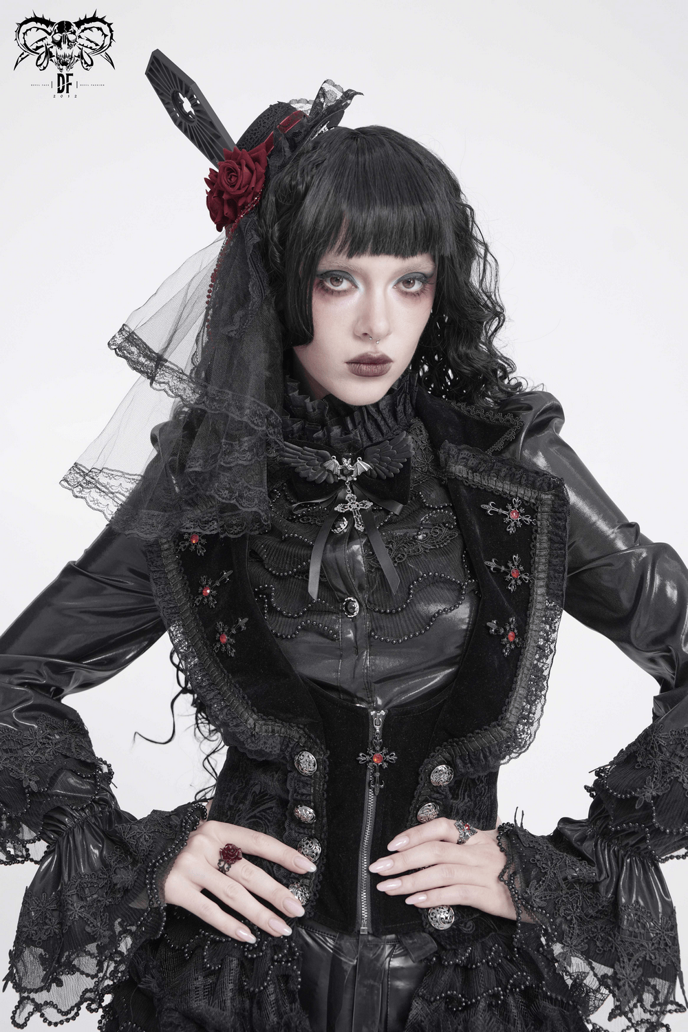 Goth Bat Wing Bow Brooch with Cross Pendant and Ribbon worn by model in Victorian gothic attire.
