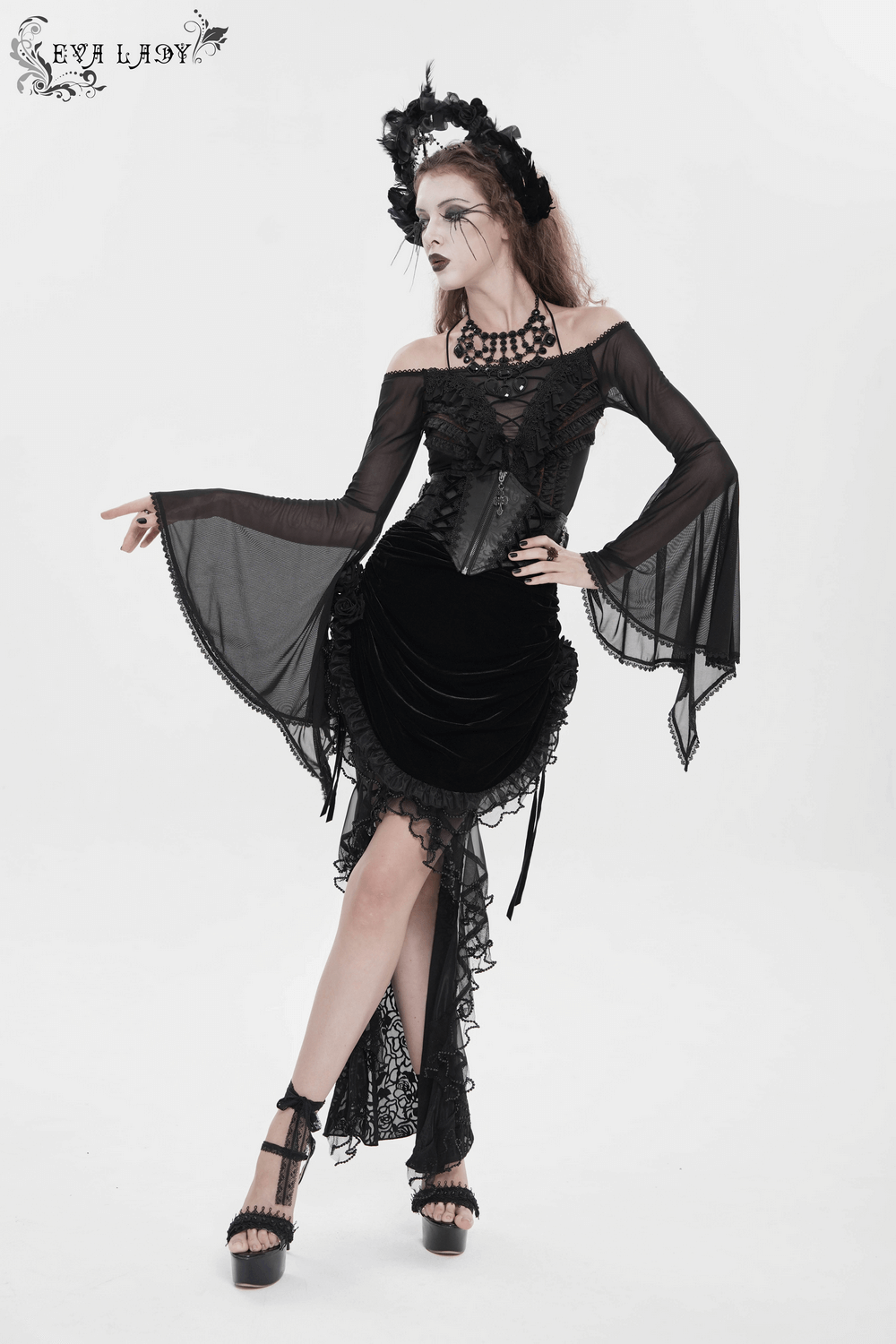 Goth Velvet and Lace Skirt with Ruffle and Rose Detailing styled with flowing black blouse and accessories.
