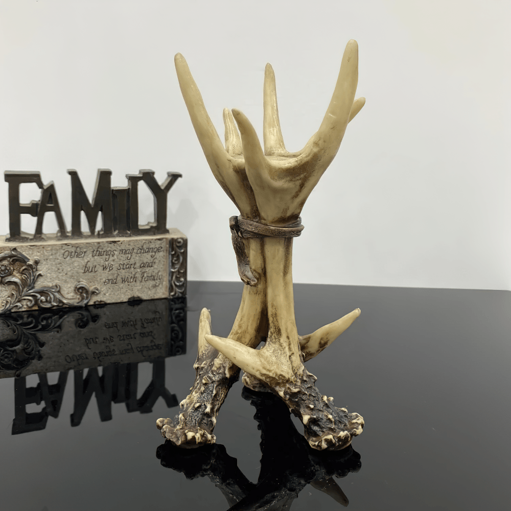 Gothic Antler Candle Holder with Rustic Bone Finish on a glossy surface, featuring a branch design and rustic wrap.