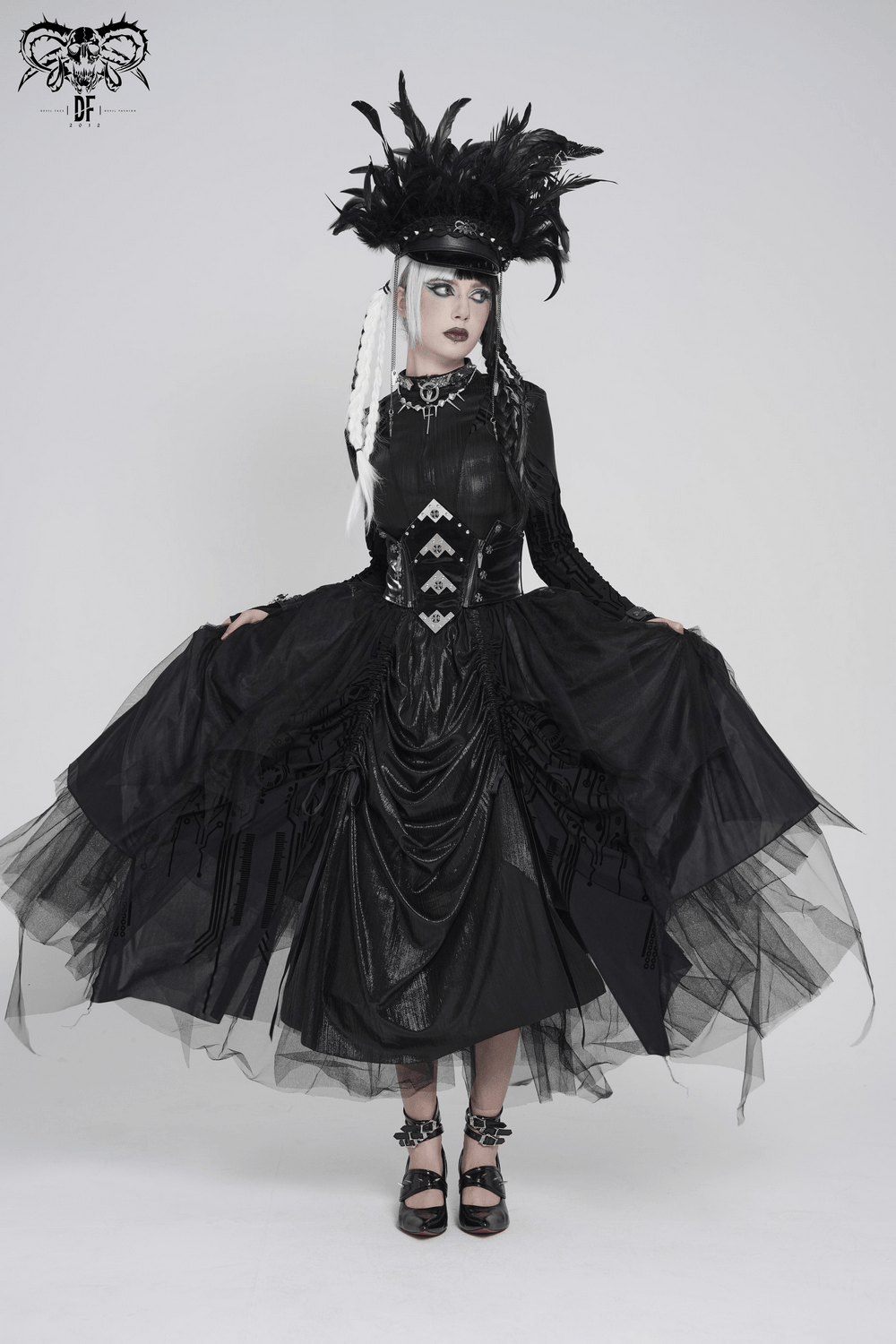 Model wearing Gothic Corset Belt with Metal Cross Stud Details Trim, featuring black layered dress and dramatic feathered headpiece.
