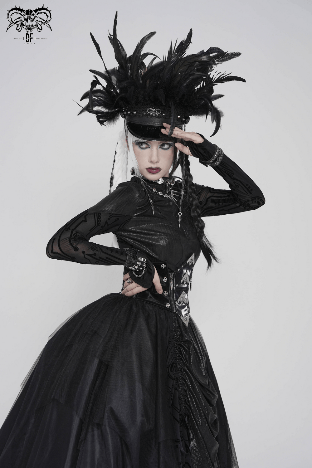 Gothic Corset Belt with Metal Cross Stud Details Trim worn by model in dramatic black attire with feathers and lace