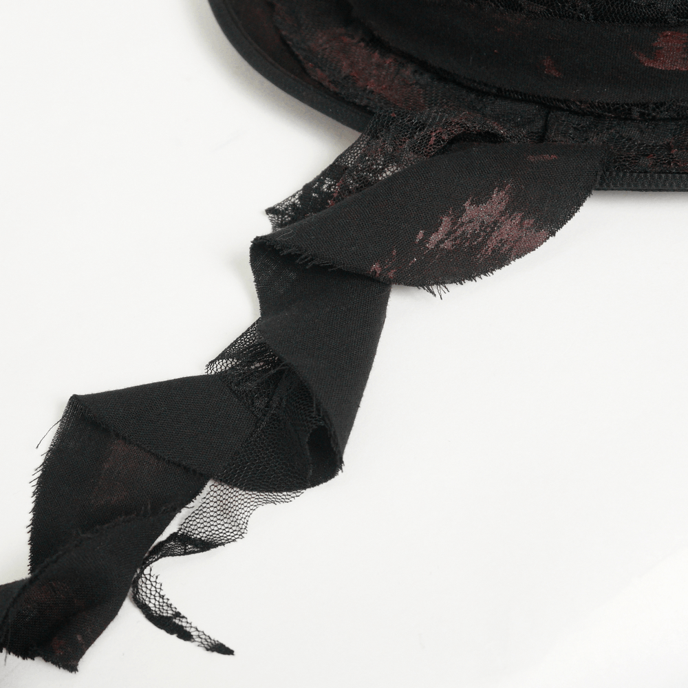 Gothic Distressed Top Hat With Vintage Lace Trim showcasing black distressed fabric and elegant lace accents.