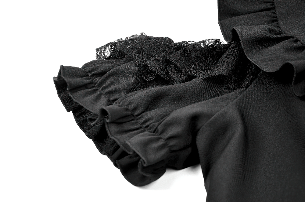 Close-up view of ruffle trim on Gothic Lace Up Cold Shoulder Blouse for Women, highlighting the intricate lace and detailing.