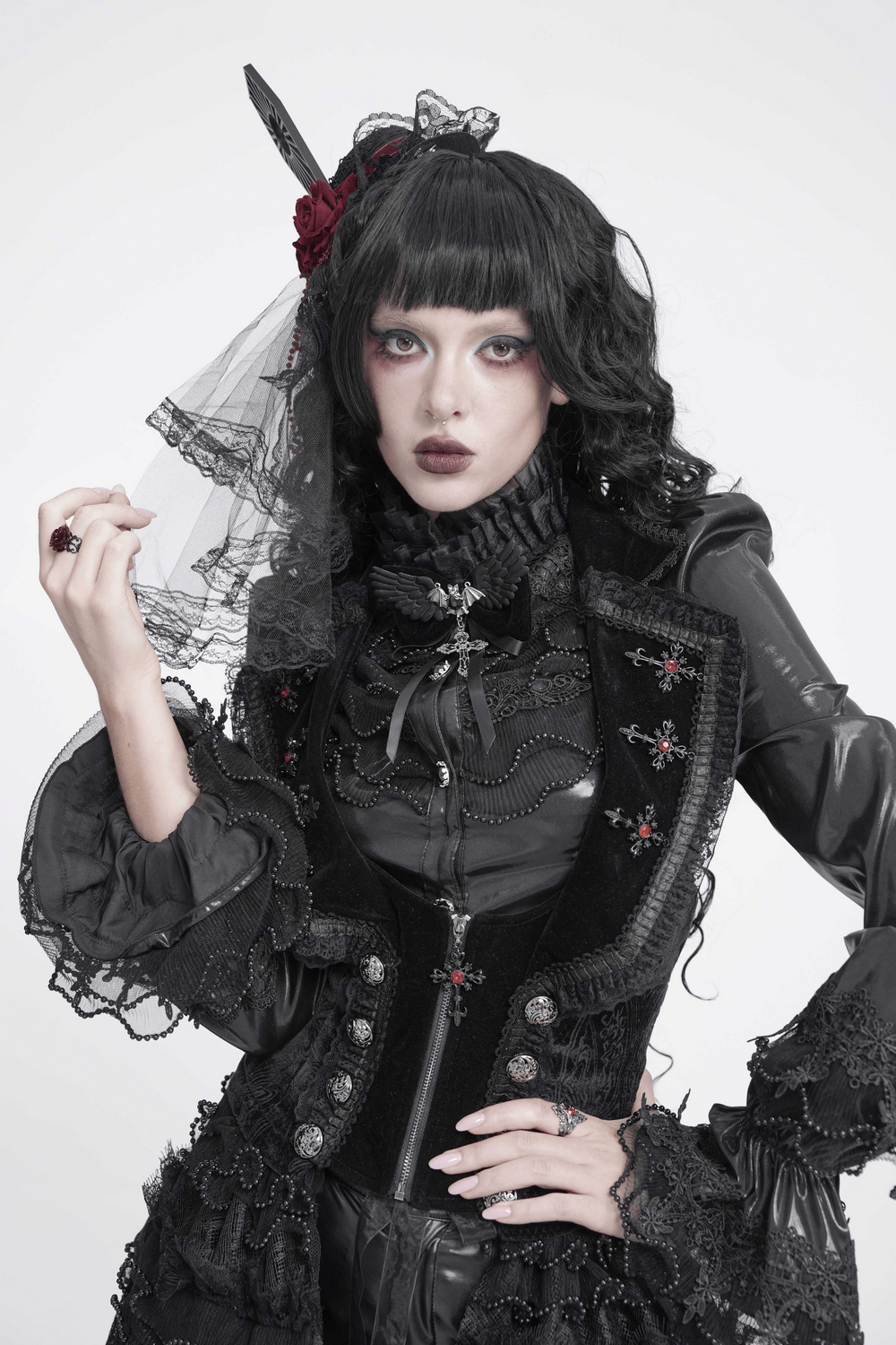 Gothic Mini Top Hat Fascinator with Lace Veil and Roses worn by model featuring dramatic Victorian ensemble.