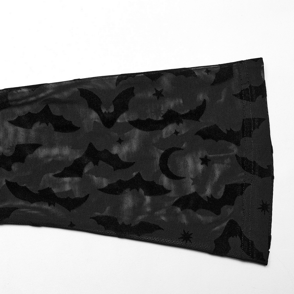 Close-up of Gothic bat-printed sheer mesh fabric, featuring bats and celestial patterns, perfect for gothic fashion.