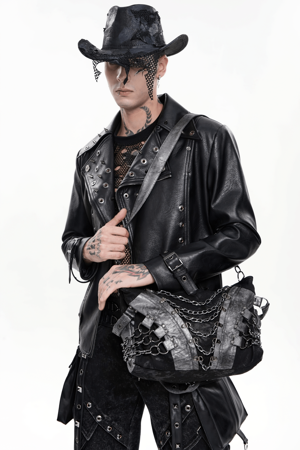 Gothic Punk Chain Shoulder Bag with Buckle Straps showcased by a model in black leather attire with chains and a stylish hat.