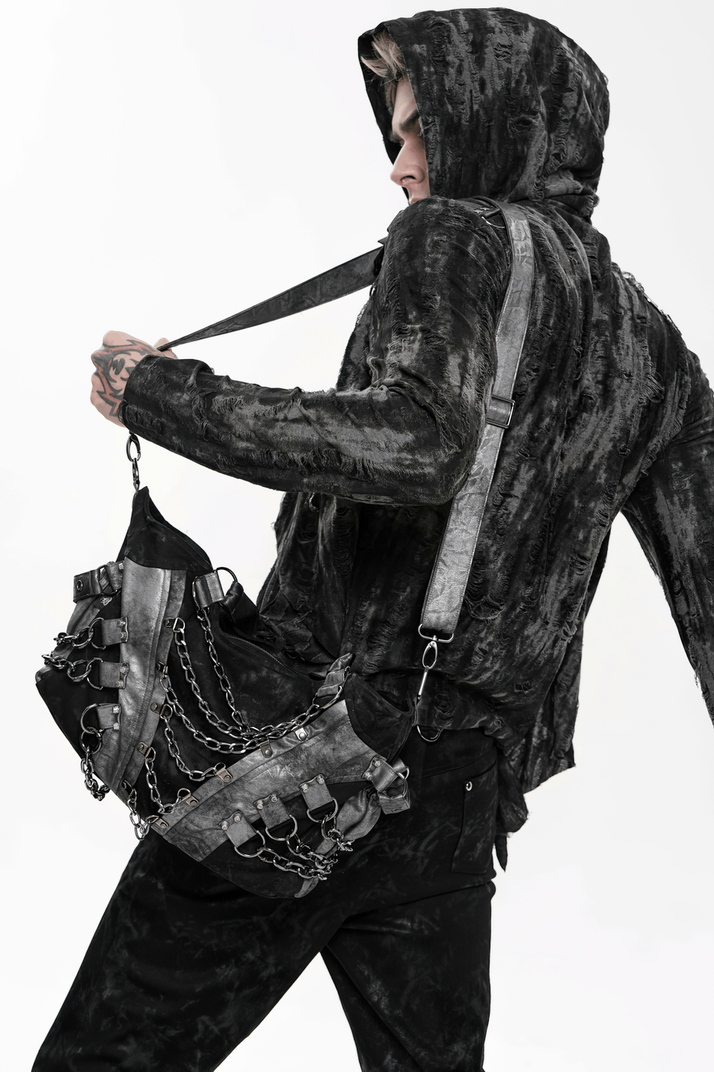 Gothic Punk Chain Shoulder Bag with Buckle Straps on model, showcasing layered chains and structured design.