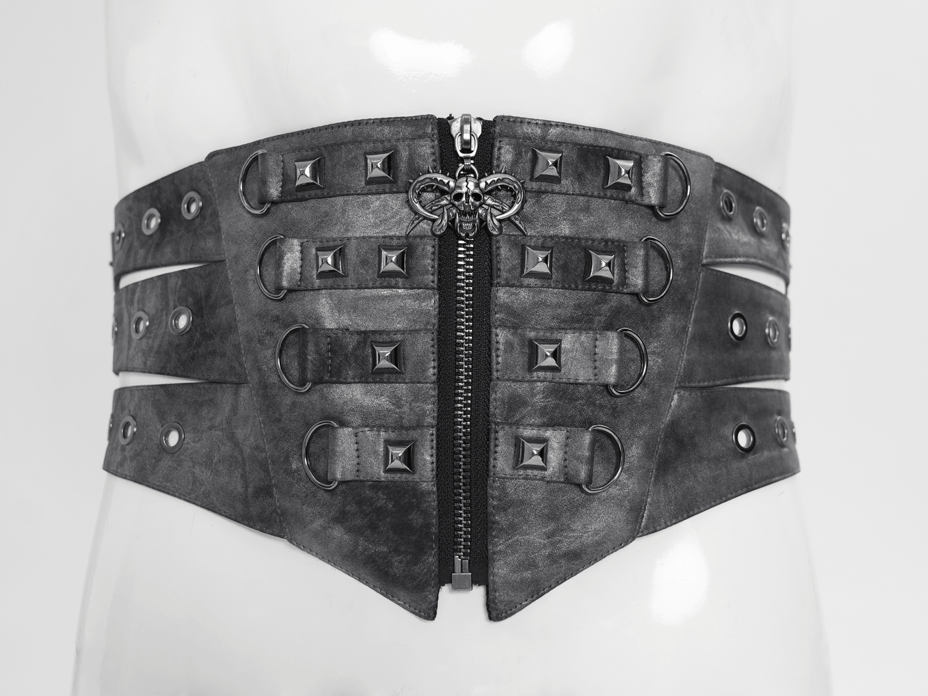 Gothic Studded Corset Belt With Front Zipper Detail showcasing pyramid studs and skull charm accent.