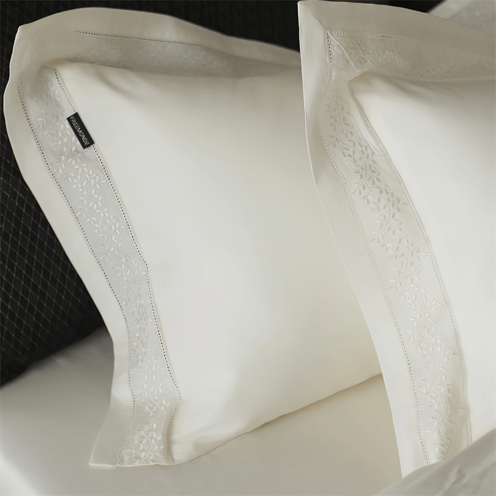 Luxury Solid Color Duvet Cover and Bedding Set pillowcases with embroidered edges on soft fabric.