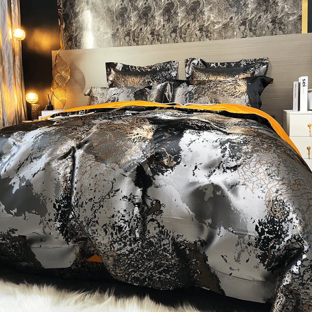 Metallic Marble Duvet Cover Set With Pillowcases on a luxurious bed with a glossy marble pattern and gold accents.