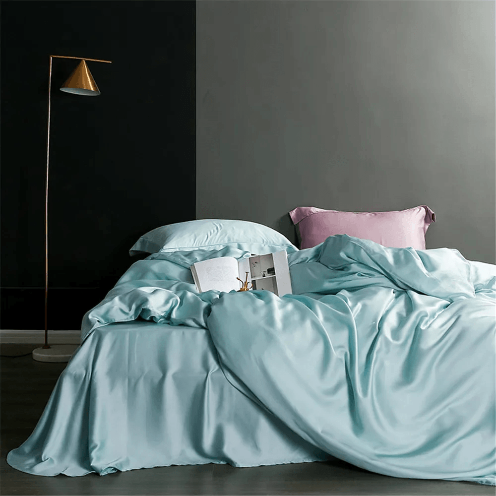 Nature Silk Bedding Set with Duvet Cover and Sheets styled on an elegant bed with soft colors and cozy accessories.