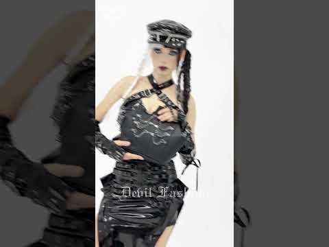 Goth Chain Shoulder Bag with Crown Silhouette Design being showcased by a model in a stylish dark streetwear outfit.