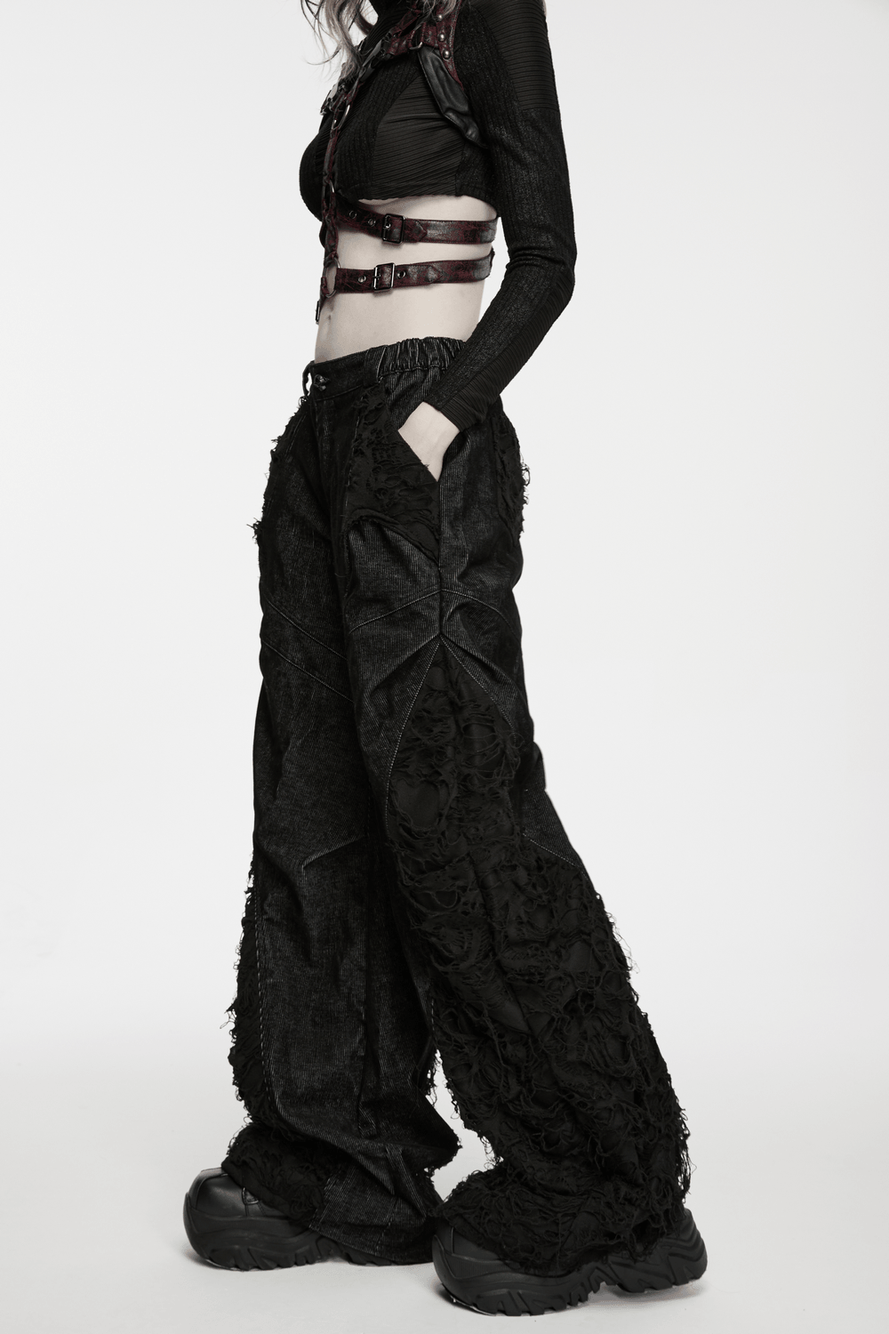 Punk Wide Leg Corduroy Pants with Shredded Mesh showcased on model, featuring layered panels and gothic design.