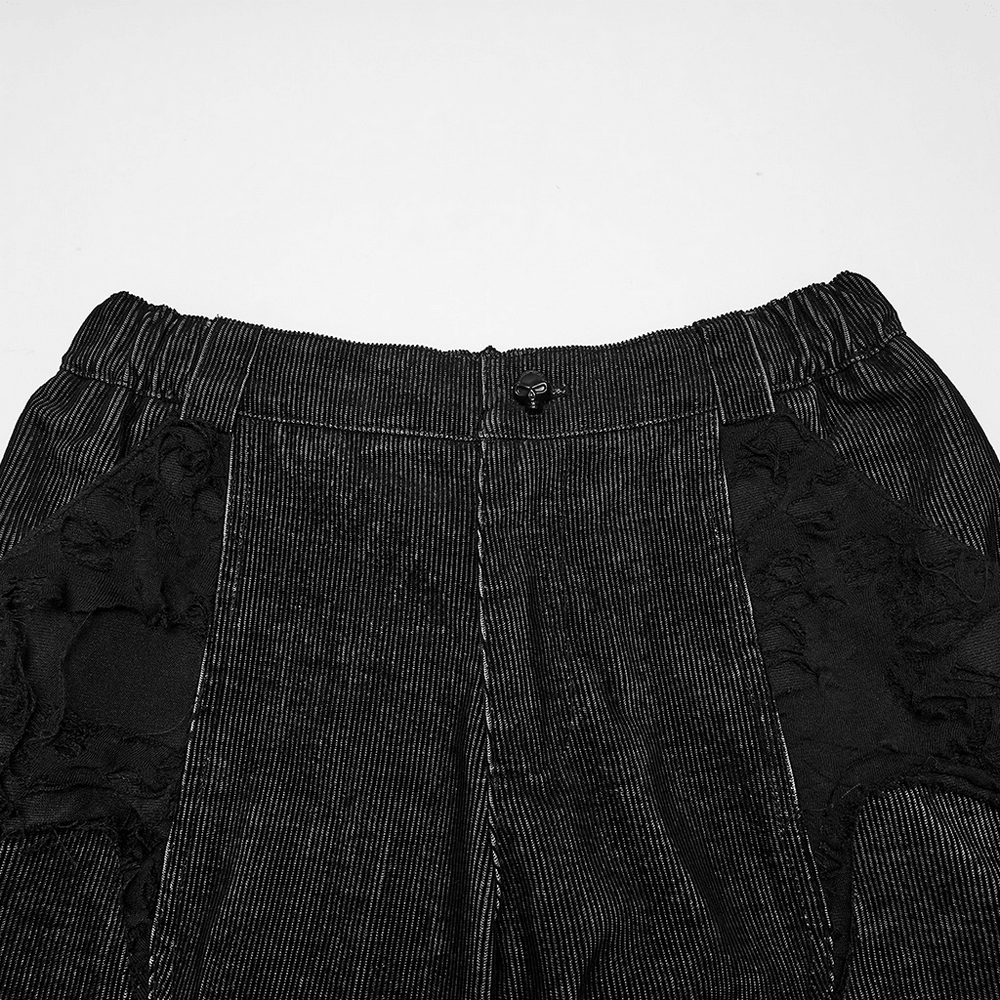 Punk Wide Leg Corduroy Pants with Shredded Mesh showcasing textured fabric and edgy design details.