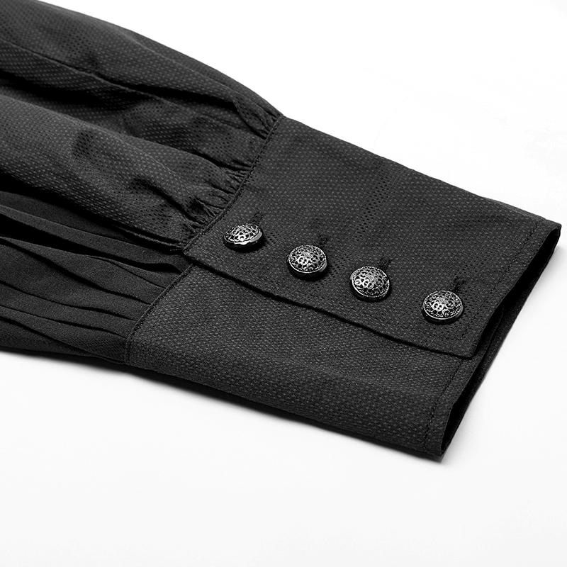 Close-up of a Victorian-inspired black steampunk shirt sleeve featuring elegant pleats and ornate buttons.