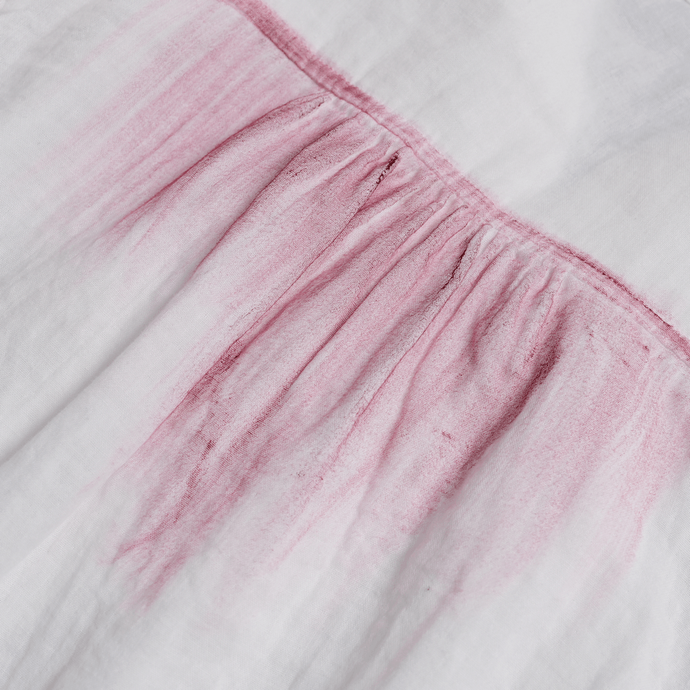 Close-up of the White Gothic Ruffle Shirt with Crimson Distressed Frills showing tattered crimson accents.