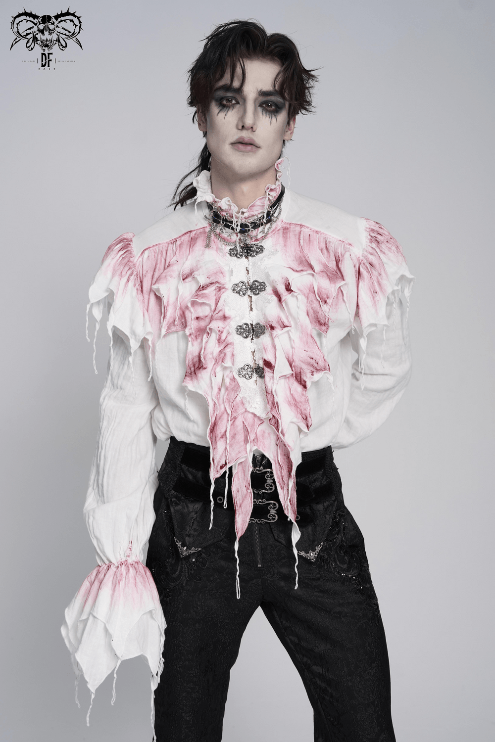 White Gothic Ruffle Shirt with Crimson Distressed Frills worn by a model, showcasing dramatic frills and a haunting style.