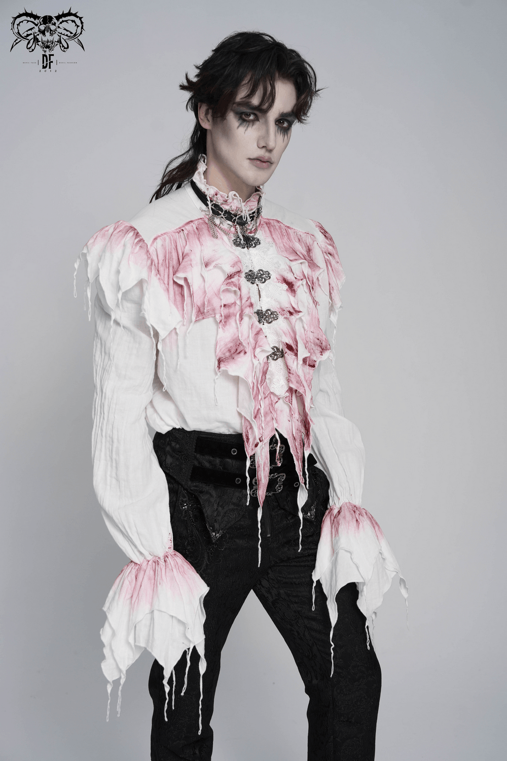 White Gothic Ruffle Shirt with Crimson Distressed Frills worn by a model with dramatic makeup, showcasing theatrical elegance.