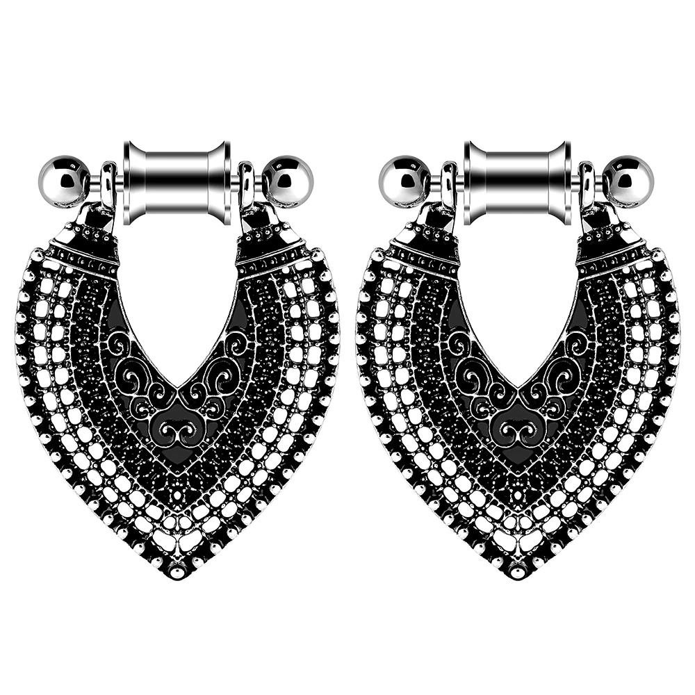 Elegant vintage gothic style stainless steel ear tunnels with heart design and intricate detailing.