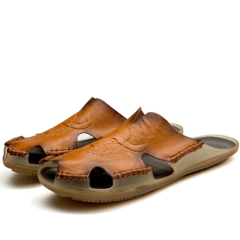 Rock style leather non-slip slippers for men, perfect for warm weather and alternative fashion.
