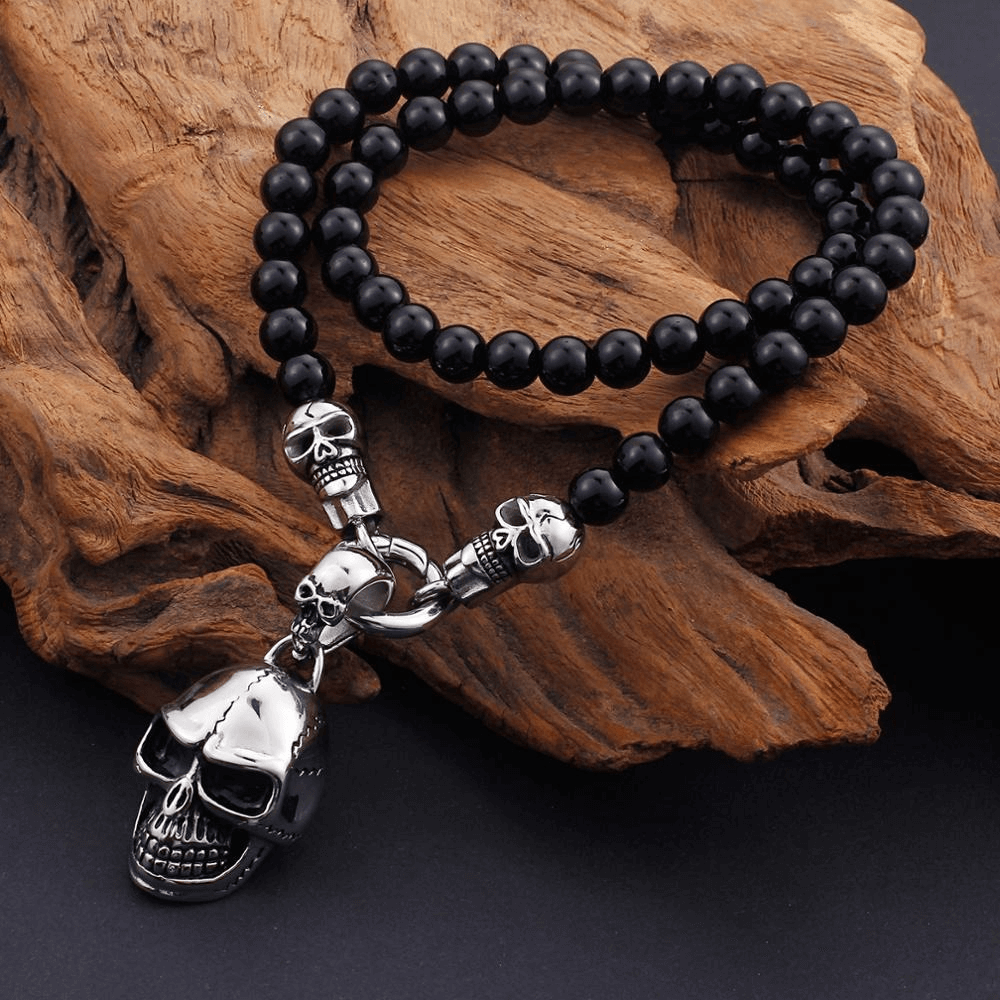 Biker chain necklace with glass beads and a stainless steel skull pendant, perfect for rock style enthusiasts.