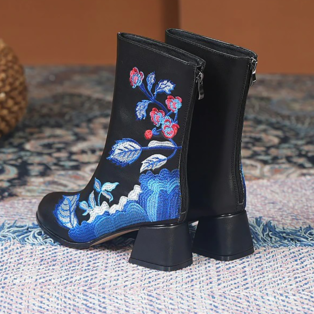 Fashion ladies black genuine leather boots with ethnic floral embroidery and square heels.